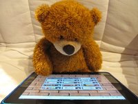 Teddybär mit Smartphone
